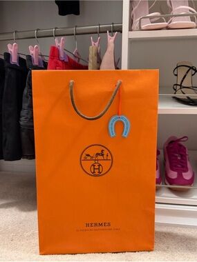 Hermes Bag with Blue Charm